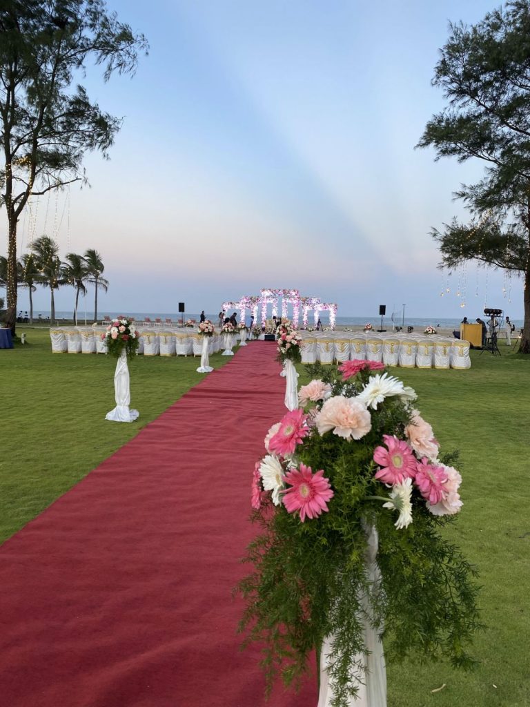 Beachside floral mandap for an outdoor wedding.